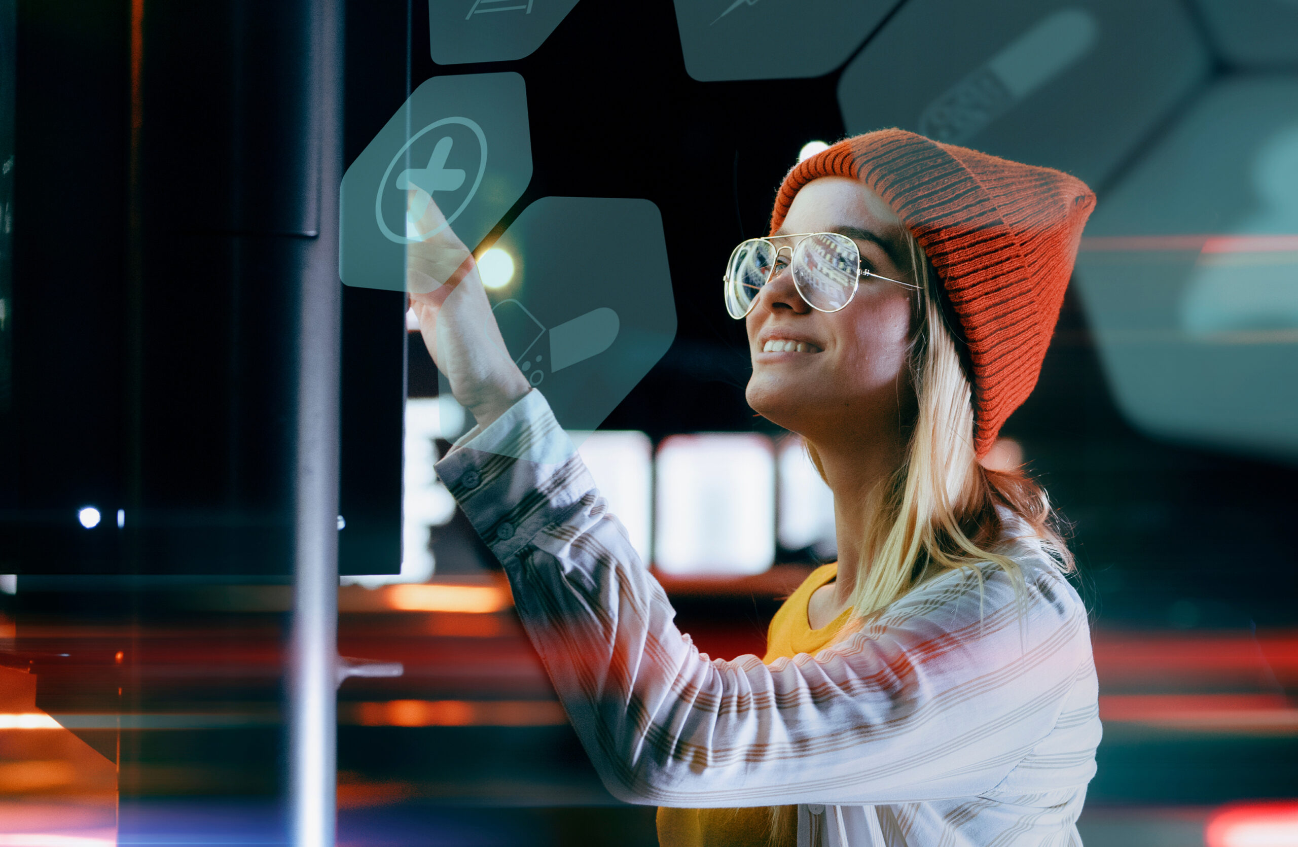 Staying up to date with technology in a fast moving world. A beautiful young millennial woman is using a digital holographic panel next to the road to check for online medical services.
